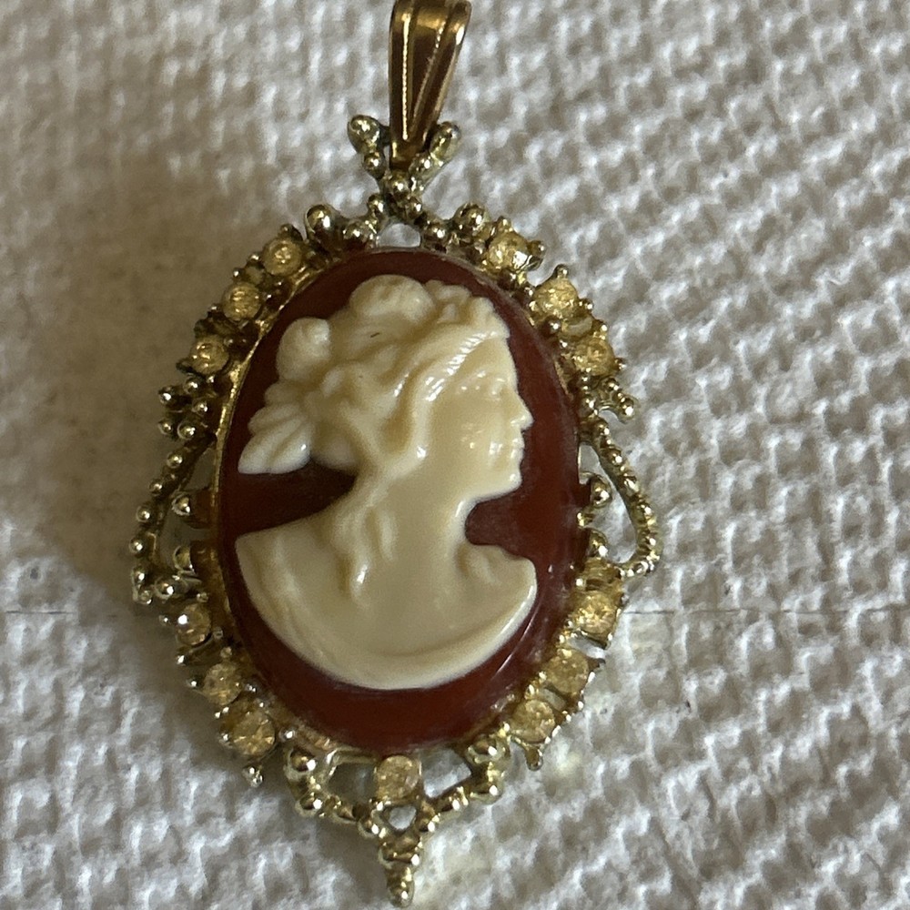 Cameo Pendant/brooch On Orange Background With Stones On Goldstone Setting