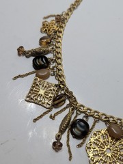 ✨VINTAGE✨ 16″ Ornate Gold Tone Dangling Necklace w/ Charms, Stones & Beads