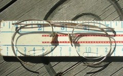 Gold “Granny” bifocal glasses, in attic
