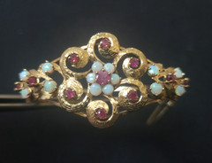 Spectacular Victorian 14K Yellow Gold Bangle Bracelet w/ Rubies and White Opals.