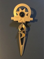 VINTAGE MATTE GOLD-TONE ABSTRACT SUN AND MOON DANGLE BROOCH