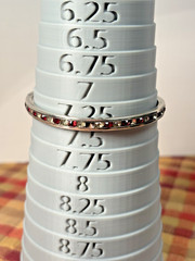 Vintage sterling silver bangle bracelet w red & clear channel set stones sz 7.25