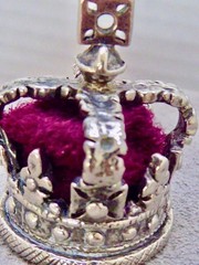 VINTAGE SILVER PLATE CROWN CHARM RED MATERIAL & SILVER 1 1/8″ MINIATURE CROWN