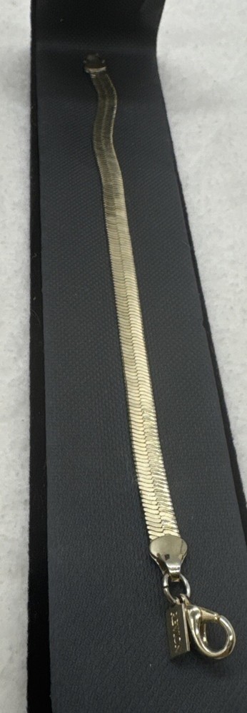 Vintage Signed REVLON Gold Tone Flat Bracelet 6.5 “