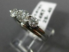 ESTATE .91CT DIAMOND 14KT WHITE GOLD 3D PAST PRESENT FUTURE TENSION RING #14161