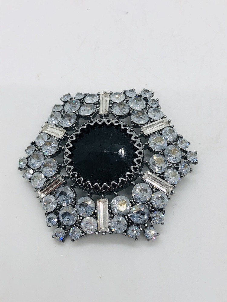Rhinestone brooch with central black rhinestone