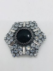 Rhinestone brooch with central black rhinestone