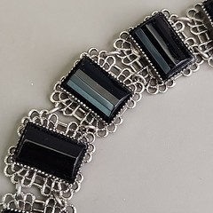 Vintage 1928 Brand Panel Bracelet Black Glass Silver Tone Filigree 7″