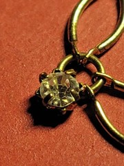 Vintage Avon Bracelet open pinched oval links light gold tone clear rhinestones.