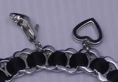 L – OLDER ANNE KLEIN SILVER TONED CHARM BRACELET WITH WATCH, 7 INCHES