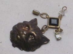vintage detailed pressed metal kitty feline cat pendant dangle charm