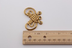 Vintage 1982 Metropolitan Museum of Art Braided Gold Tone Bow Pendant MMA