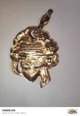 A Detailed Venetian Mask Charm in Gold-Tone Metal with Enamel and Crystal Detail