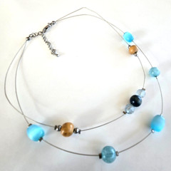 Blue Glass Wood & Acrylic Floating Bead Floating Silver Tone Necklace 17.75″ Adj