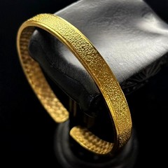 Golden Cuff Bangle Bracelet Gold-wash (NOT SURE) marked ‘999’, 7.5 in adjustable