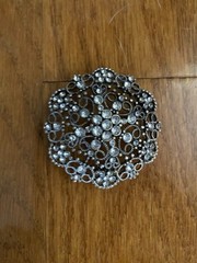 Round Silver Tone Base Metal Brooch With Clear Rhinestones 1 3/4 Inches