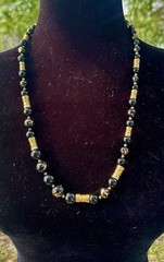 vintage-style black and gold beaded statement necklace,