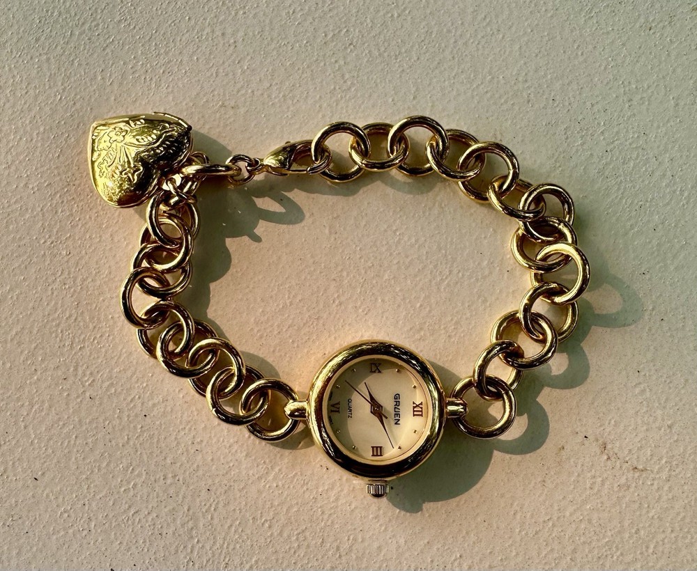 vintage Gruen Gold-Tone Charm Bracelet Watch.