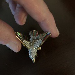 Gold tone colorful bird pin with rhinestones and moveable wings