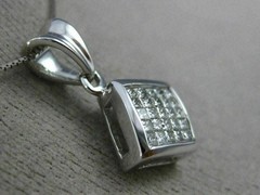 ESTATE .55CT PRINCESS DIAMOND 14KT WHITE GOLD SQUARE INVISIBLE FLOATING PENDANT