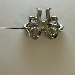 Vintage Monet Clear Rhinestones Bow Brooch Silver Tone Emerald Cut Center Stone