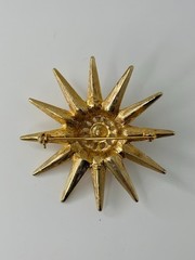 Vintage Sparkly Starburst Brooch Signed Graziano Gold Base With Topaz Rhinestone