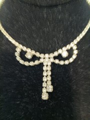 vintage 1950’s silver tone rhinestone dangle bow Tie necklace