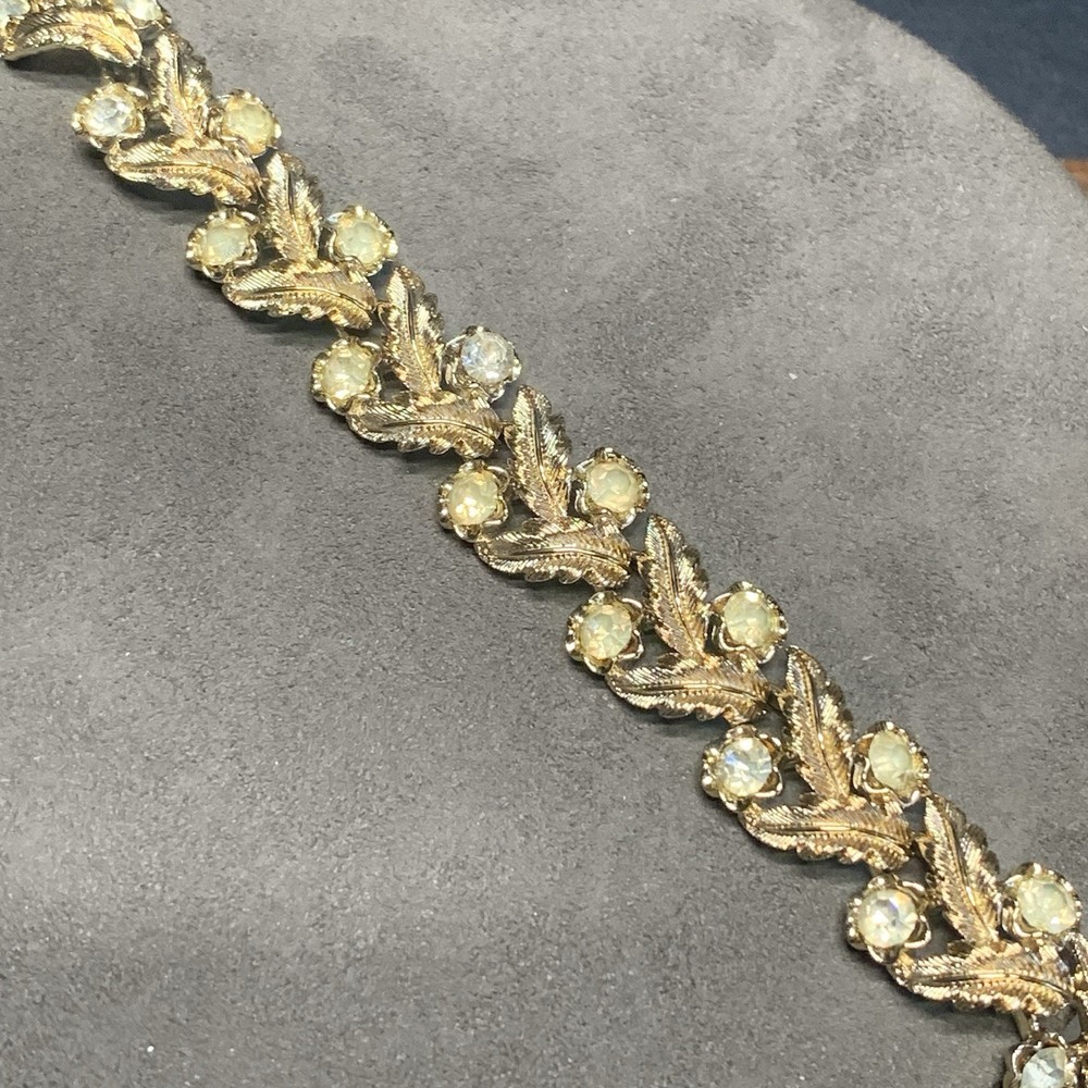 Vintage Coro 7.5” Bracelet Textured Gold Tone Leafs Rhinestones Fold Over Clasp
