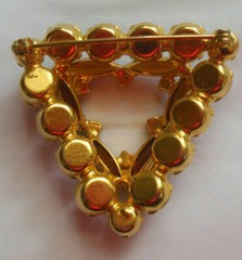Triangular Shape Brooch with multi color faceted prong-set stones