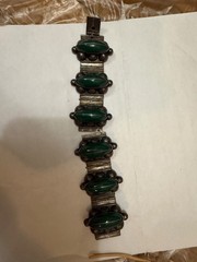 vintage sterling silver bracelet features marquise-cut green onyx stones bezel-s