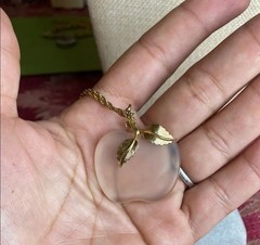 Vintage Avon frosted glass apple pendant on a gold-tone chain