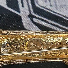 Women’s gold tone with rhinestone golf bag pin/Brooch.