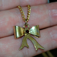 Vintage Gold Tone Necklace & Bow Shaped Pendant with Red Rhinestone