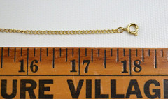 Vintage Gold Tone Necklace & Bow Shaped Pendant with Red Rhinestone