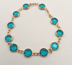Vintage Swarovski gold-tone bezel-link bracelet Aqua blue Crystals 8″ Swan mark