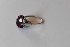 MARKED STERLING SARAH COV SIZE 8.5 RING WITH PRONG SET RED STONE