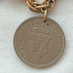 VINTAGE COIN CHARM BRACELET 11 INT COINS