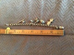 VINTAGE 1950’s CORO BRASS -TONE 6” CHARM BRACELET, 7 Charms Sports Themed