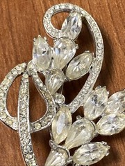 vintage rhinestone floral spray brooch, similar to designs from the 1940s-1950s
