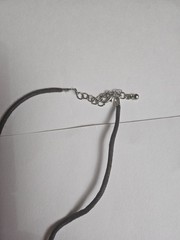 Vintage Black Leather Cord Necklace with Round Beige Stone Pendant.