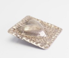 One of a kind artisan sterling silver heart relief modern pendant by Alissa