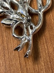 vintage rhinestone floral spray brooch, similar to designs from the 1940s-1950s