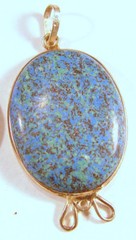 Sterling silver pendant with man-made blue stone, 2″ long