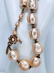 Miriam Haskell statement necklace featuring oversized faux baroque pearls.