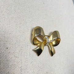 Gold-Tone Bow Brooch With Rhinestone Accents Marked