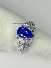 Pear Cut Blue 2.24CT Tanzanite With 0.66CT Shiny White CZ Best Engagement Ring