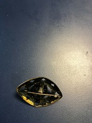 vintage metal with black stone center jewelry brooch pin