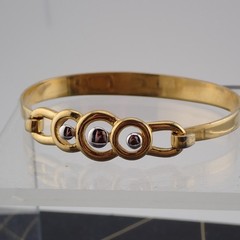 Vintage Crown Trifari Gold Silver Tone 6 1/4″ Petite Tension Bangle Bracelet