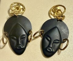 Vintage 1990s Figural African Face earrings. Wearable Art
