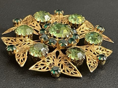 Vintage Celebrity Rhinestone Brooch Green Gold Tone Signed NY “GLOWS”
